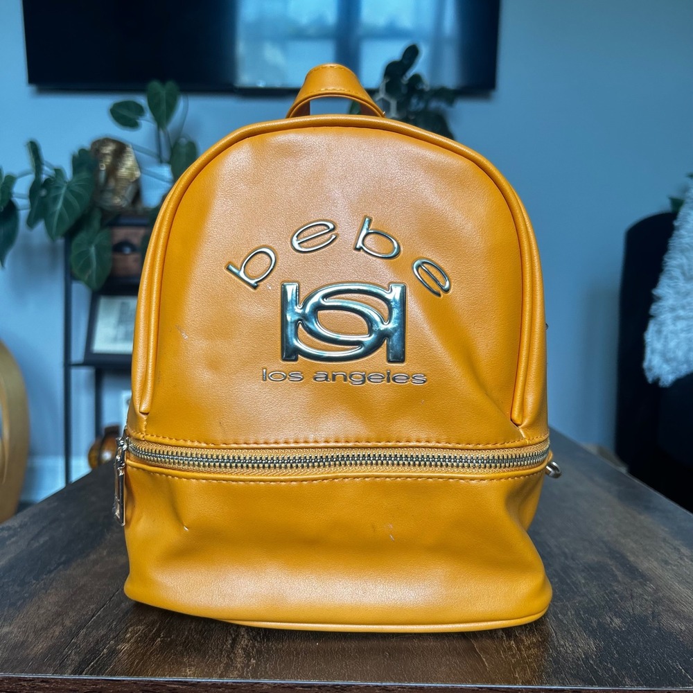 Bebe Kayla Small Backpack Women OS Apricot Orange NWT Faux Leather Mini Bag Logo